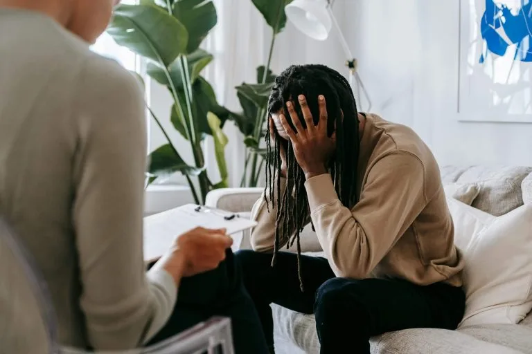A client sharing during a therapy session